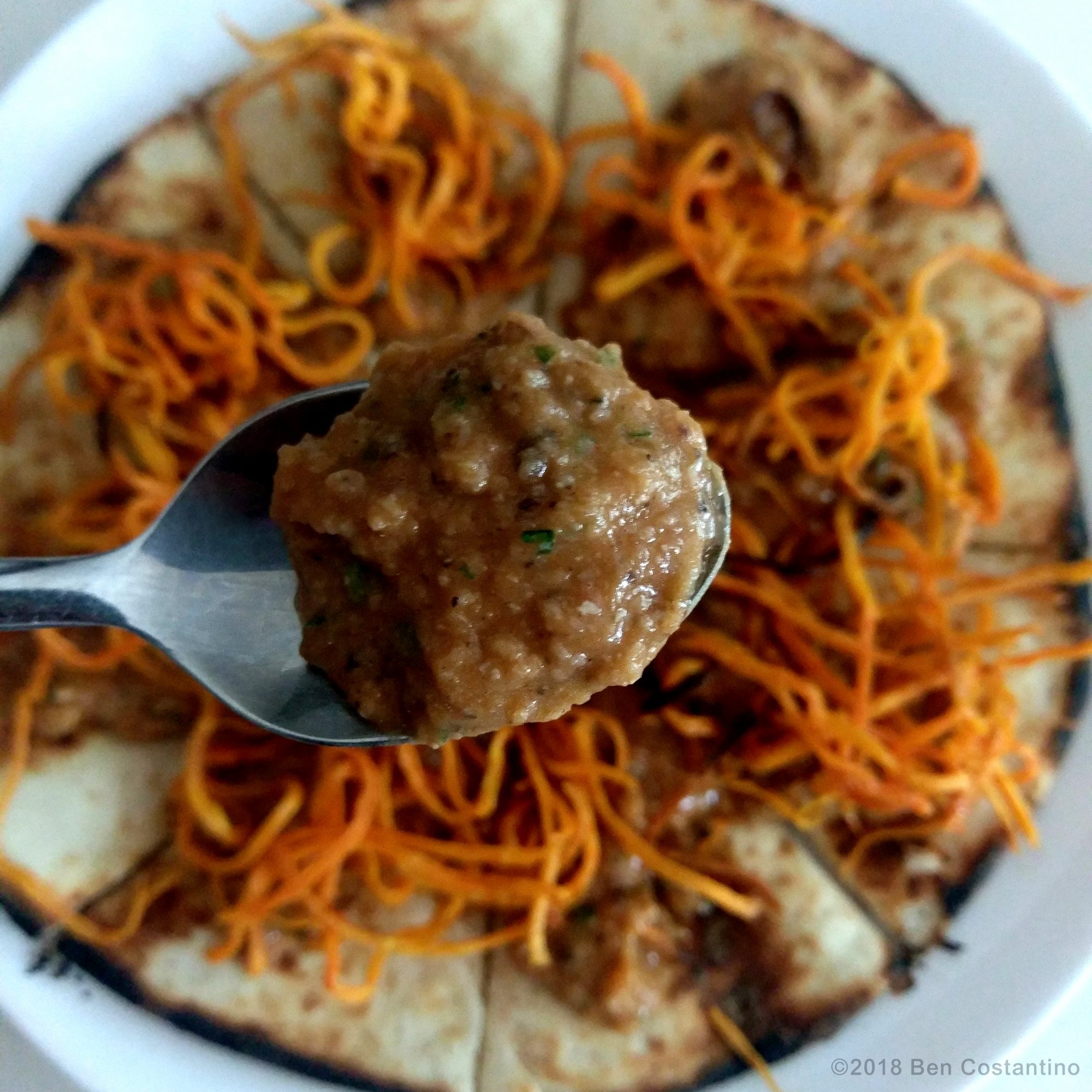 shoestring fried sweet potatoes on pita with blackeyed pea dip