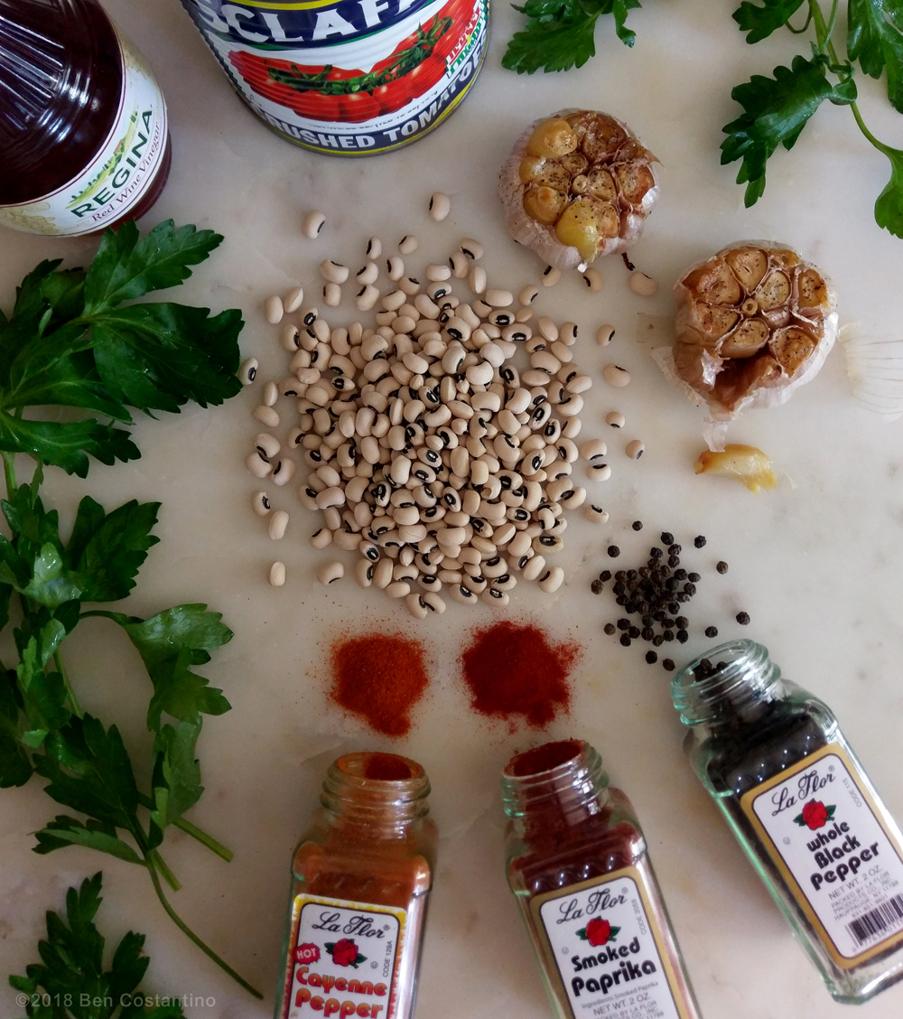 Black-eyed pea dip ingredients Blackeyed peas, parsley, red wine vinegar, tomatoes, roasted garlic, cayenne pepper, smoked paprika, and black pepper