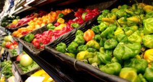 Ajicito Dulce peppers on display at the grocery store , next to Habañeros