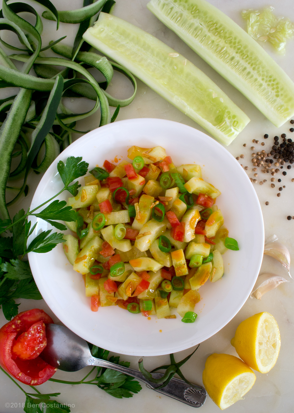 cucumber salad ingredients cucumbers, parsley, lemon juice, cored tomato, garlic, black pepper, coriander
