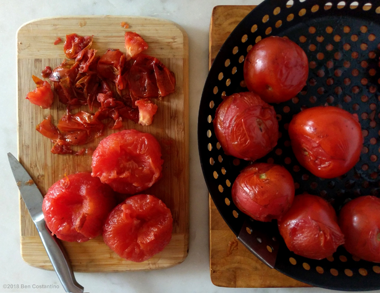 smoked tomatoes fresh off the grill with skins removed