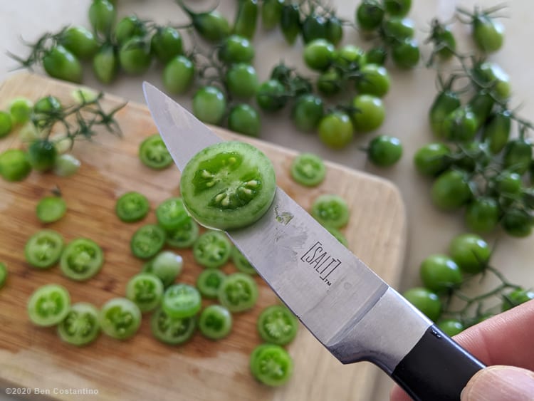 a sliced green cherry tomato 