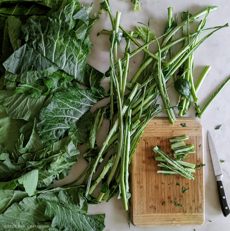 collard green with stems being removed