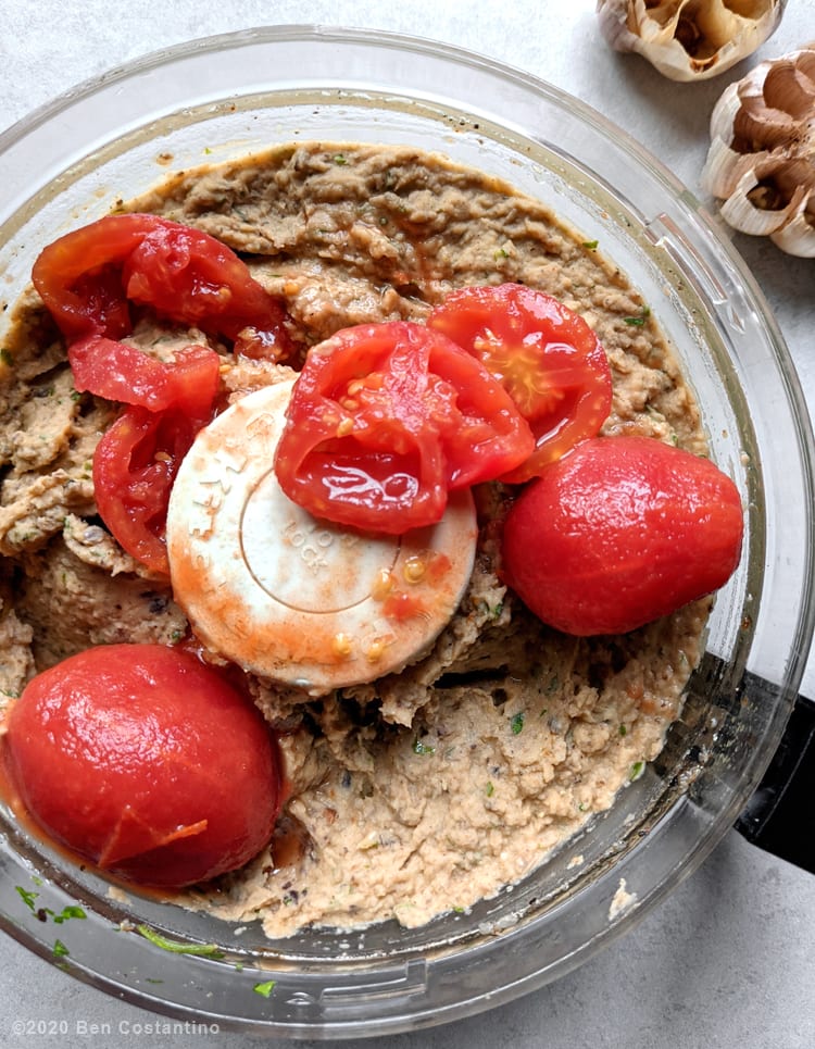 cored tomatoes added to blackeyed pea dip