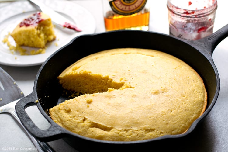 maple cornbread in a cast iron skillet