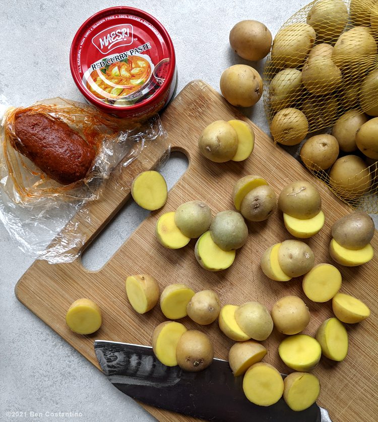 baby potatoes halved, with Thai curry paste