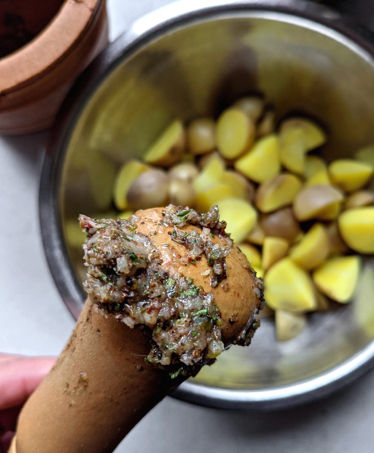 jerk seasoning mashed to a paste with a pestle