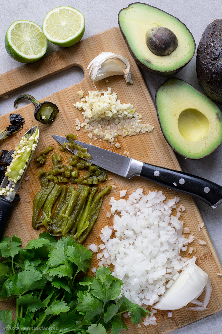 Jalapeño guacamole ingredients on a cutting board